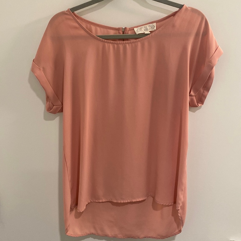 Pink short sleeve dress shirt.